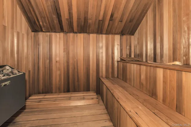 a view of a utility room with wooden floor