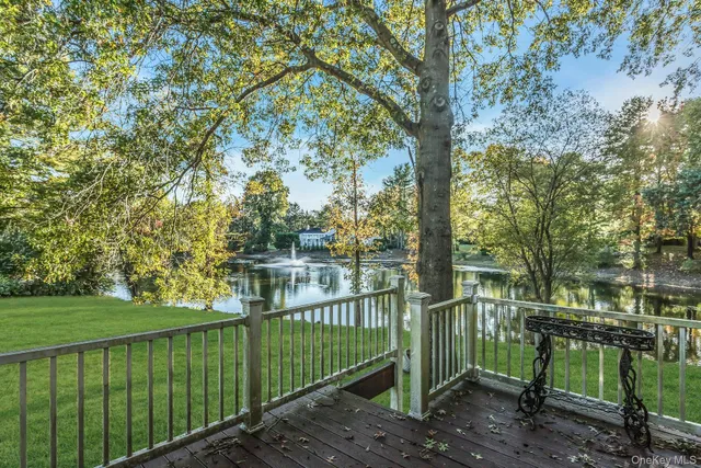 a view of a pathway with a lake view