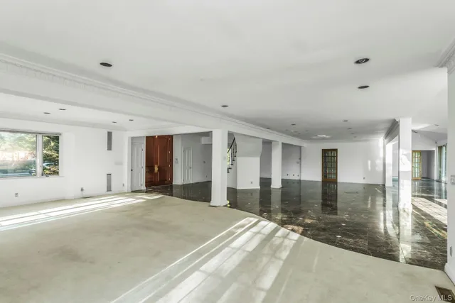 a view of a hallway with a large window