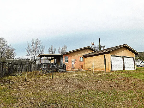a front view of a house with ocean view