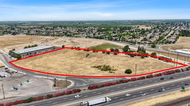 an outdoor space with lots of people seating