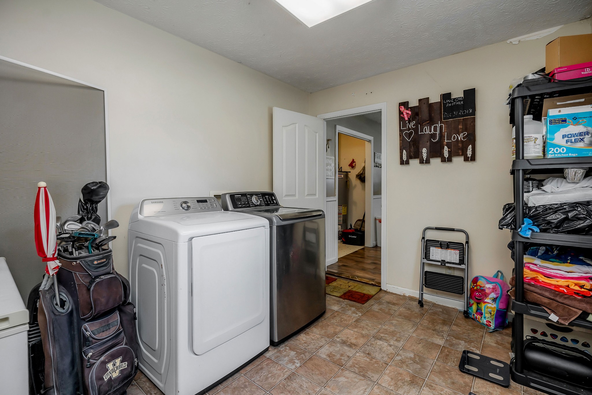 409 Kendra Drive Smithville, TN 37166 - Photo 11 of 27 a view of a storage & utility room with washer and dryer