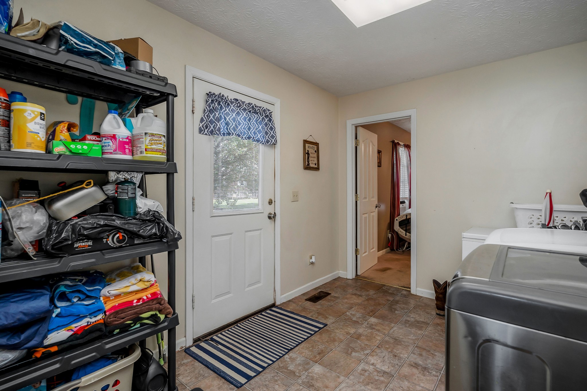 409 Kendra Drive Smithville, TN 37166 - Photo 12 of 27 a view of a livingroom with wooden furniture and closet