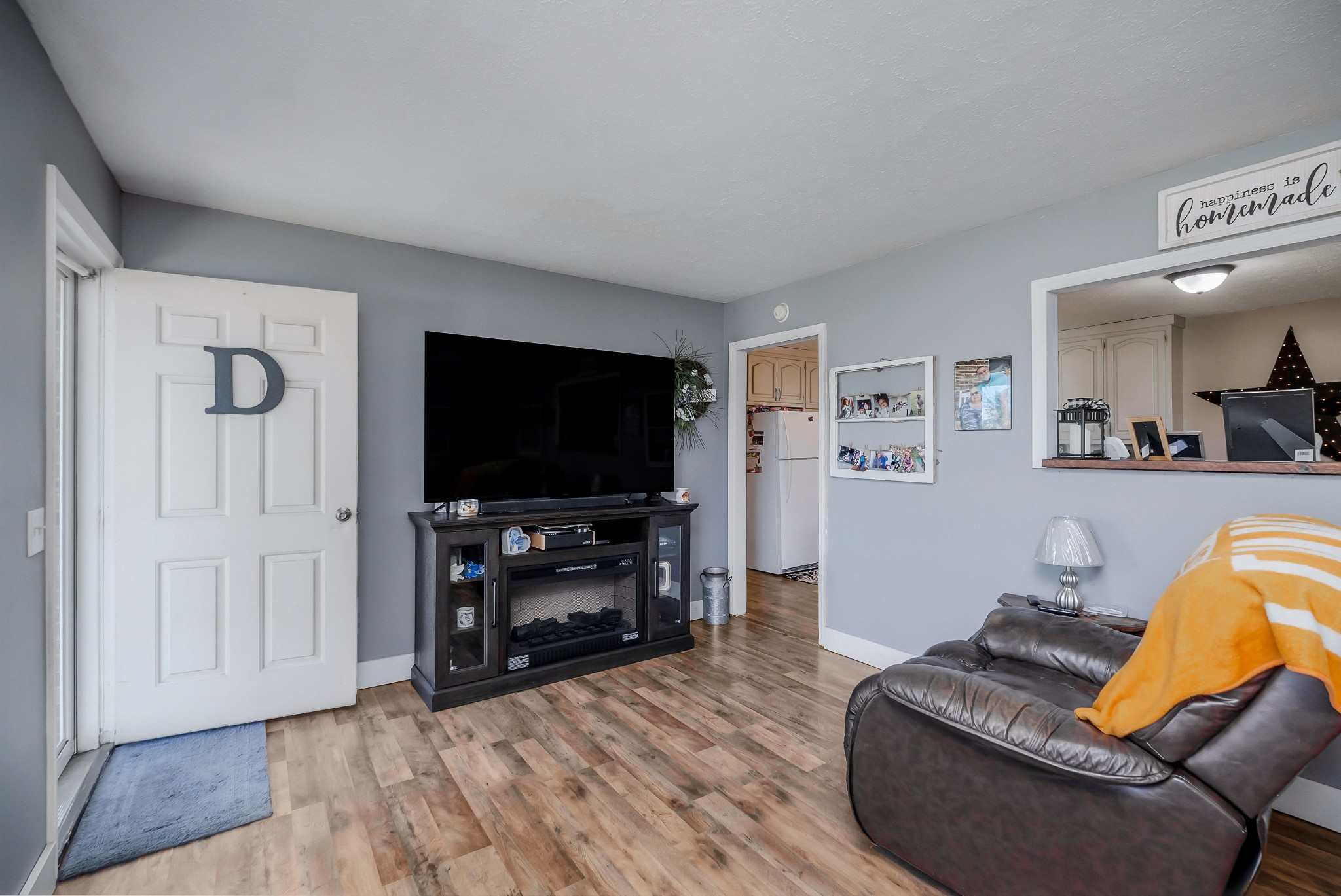 409 Kendra Drive Smithville, TN 37166 - Photo 5 of 27 a living room with furniture and a flat screen tv