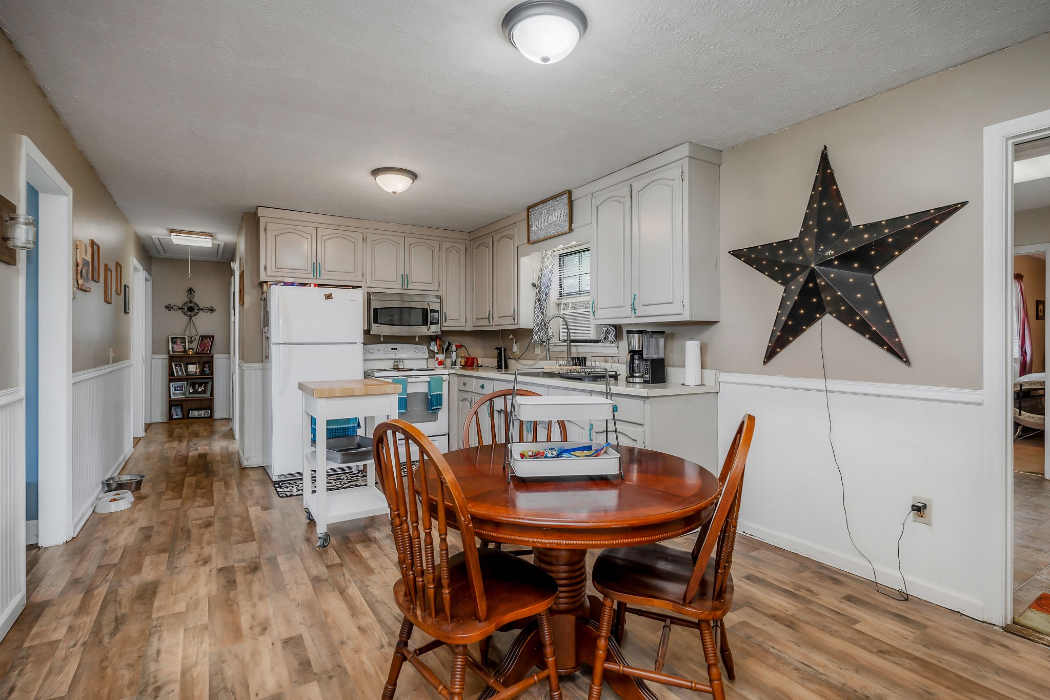 409 Kendra Drive Smithville, TN 37166 - Photo 10 of 27 a view of a dining room with furniture and wooden floor