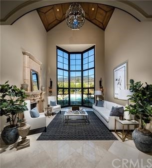 18 Dovetail Lane Bradbury, CA 91008 - Photo 12 of 40 a living room with furniture and a large window