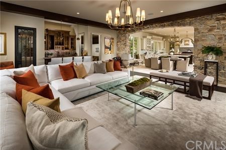 18 Dovetail Lane Bradbury, CA 91008 - Photo 18 of 40 a living room with furniture a chandelier and a dining table