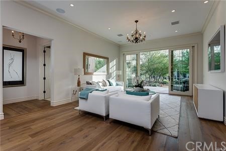 18 Dovetail Lane Bradbury, CA 91008 - Photo 29 of 40 a living room with furniture and a chandelier
