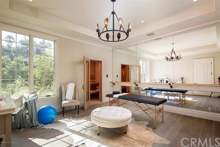 18 Dovetail Lane Bradbury, CA 91008 - Photo 33 of 40 a living room with furniture a chandelier and a large window