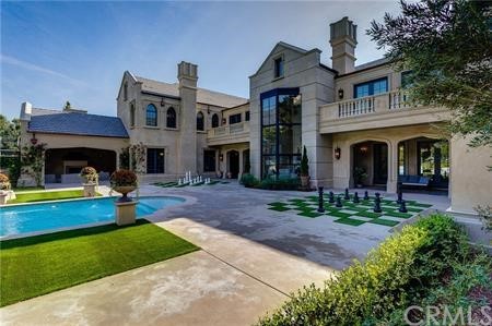 18 Dovetail Lane Bradbury, CA 91008 - Photo 5 of 40 a view of house with a yard and a large tree