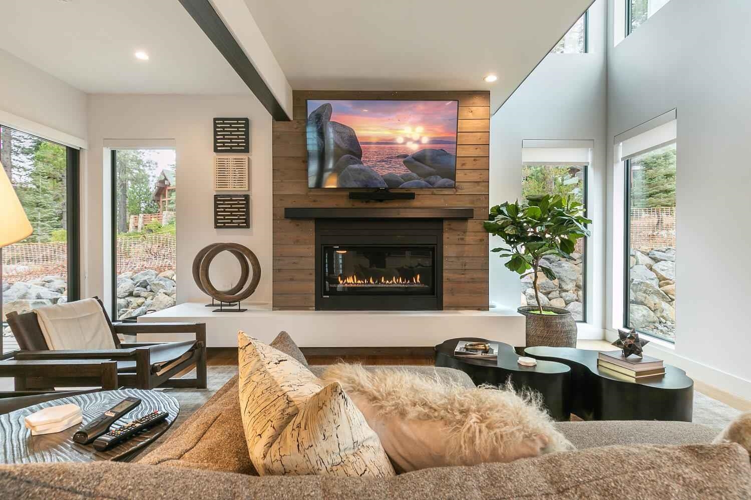 342 Palisades Circle Olympic Valley, CA 96146 - Photo 2 of 21 a living room with furniture and a fireplace
