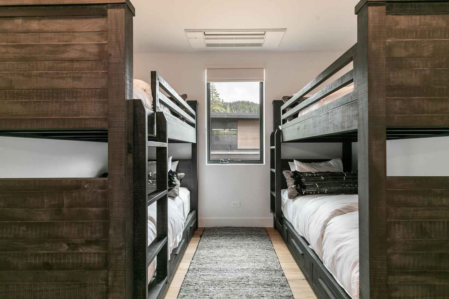 342 Palisades Circle Olympic Valley, CA 96146 - Photo 21 of 21 a bedroom with a bed next to a window