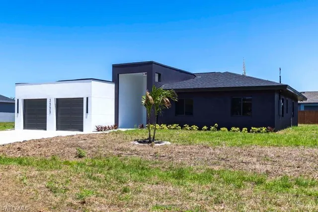 a house view with a garden space