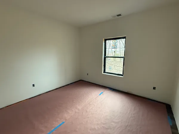 an empty room with a window