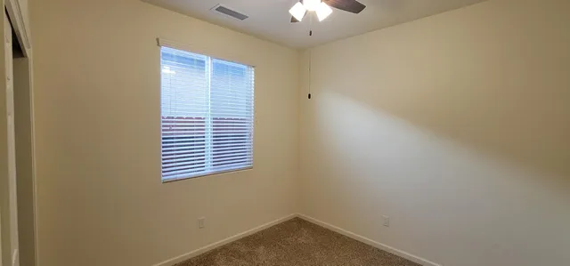 a view of a room with a window