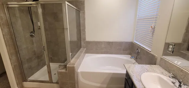 a bathroom with a sink and toilet