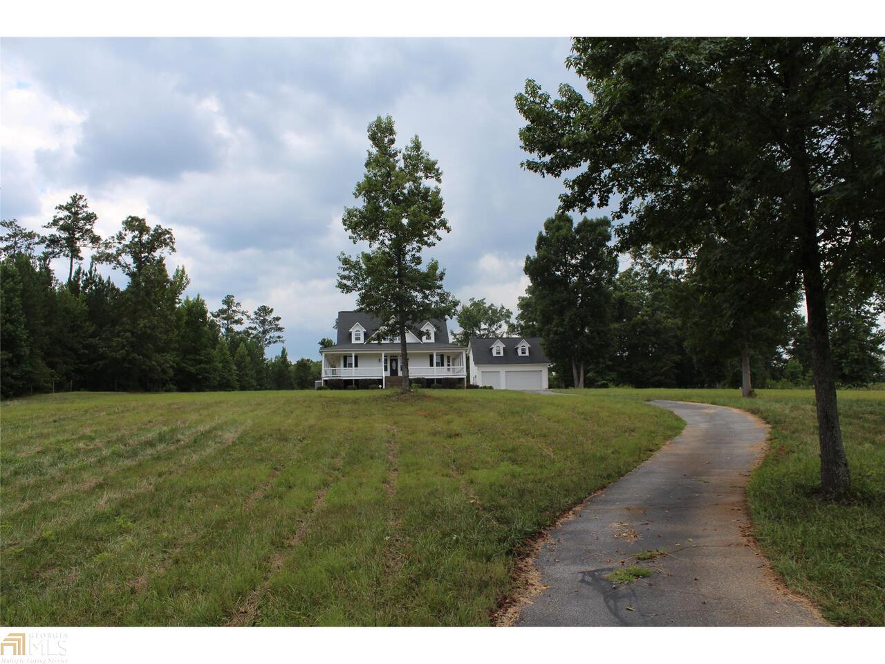 3380 Partain Road Monroe, GA 30656 - Photo 1 of 1 a big yard with lots of green space