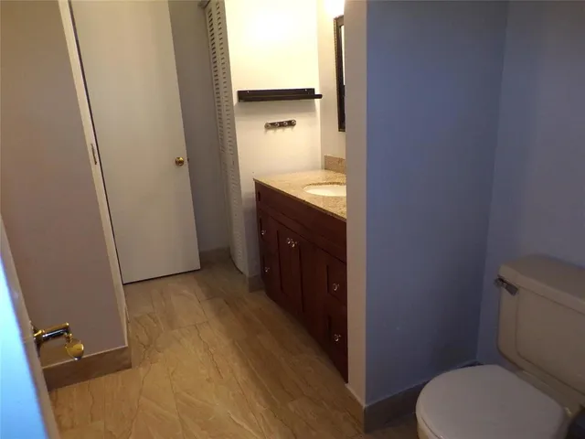 a bathroom with a sink and a toilet