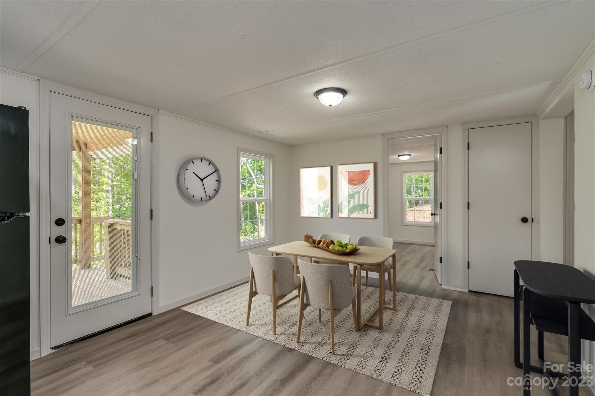 175 King Stepp Road Mill Spring, NC 28756 - Photo 42 of 46 a view of a dining room with furniture and a window