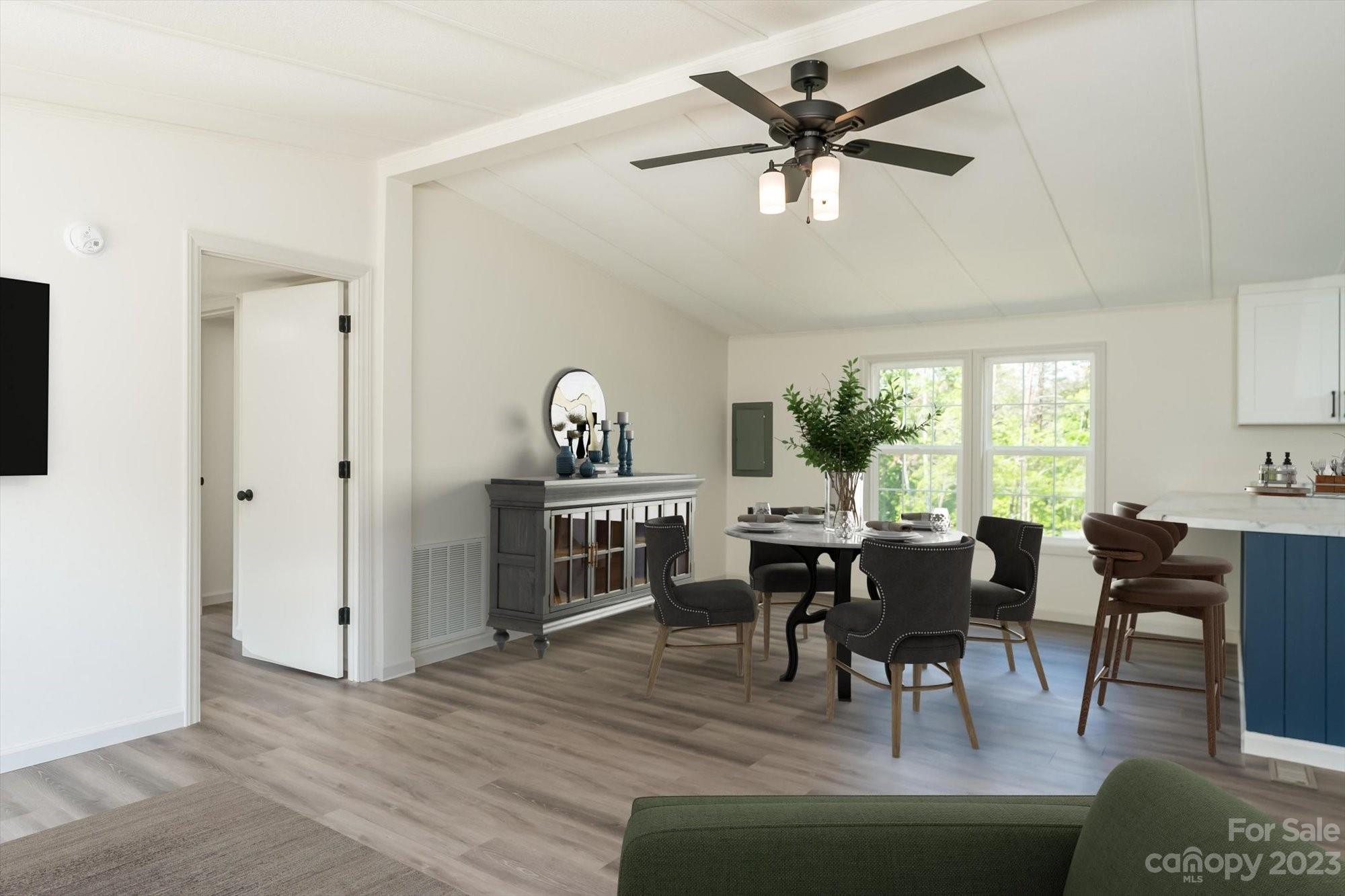 175 King Stepp Road Mill Spring, NC 28756 - Photo 46 of 46 a view of a livingroom with furniture window and wooden floor