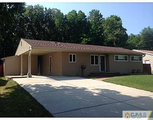 192 Princeton Road Old Bridge, NJ 08859 - Photo 2 of 25 a front view of a house with a yard