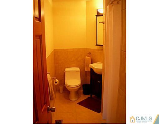 192 Princeton Road Old Bridge, NJ 08859 - Photo 11 of 25 a bathroom with a toilet and a sink