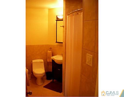 192 Princeton Road Old Bridge, NJ 08859 - Photo 12 of 25 a bathroom with a toilet and a shower