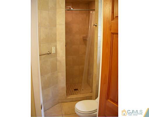 192 Princeton Road Old Bridge, NJ 08859 - Photo 20 of 25 a bathroom with a toilet and shower
