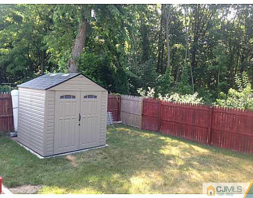 192 Princeton Road Old Bridge, NJ 08859 - Photo 25 of 25 a view of backyard with wooden fence