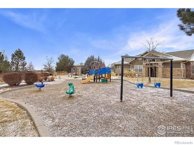 a view of residential houses with street