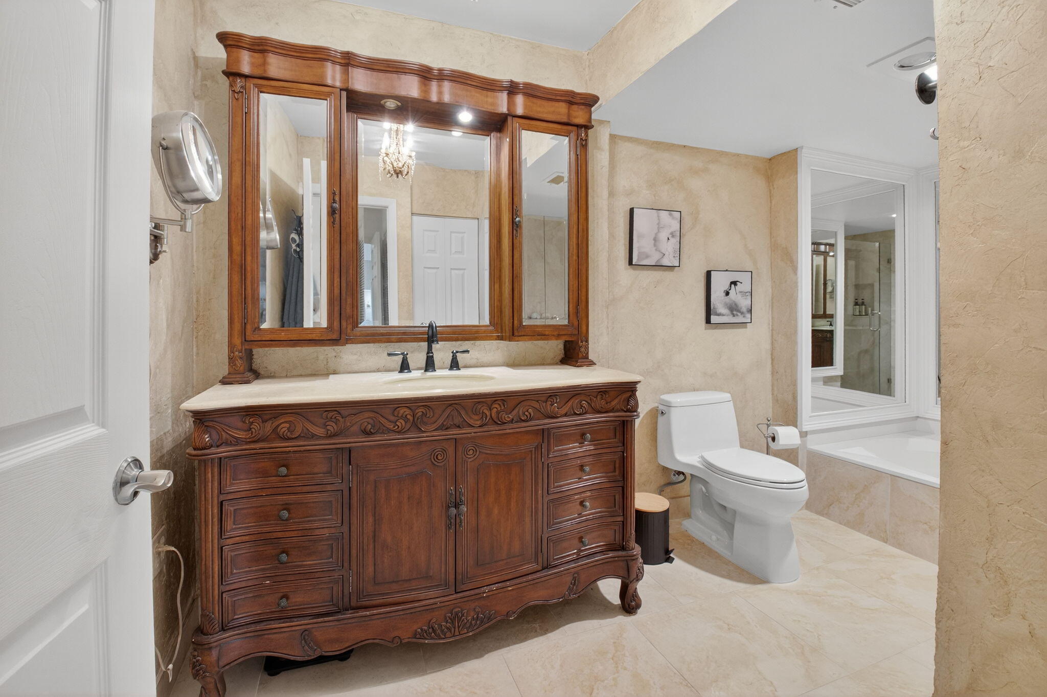 24 Westgate Lane, Unit A Boynton Beach, FL 33436 - Photo 12 of 94 a bathroom with a sink vanity mirror and toilet