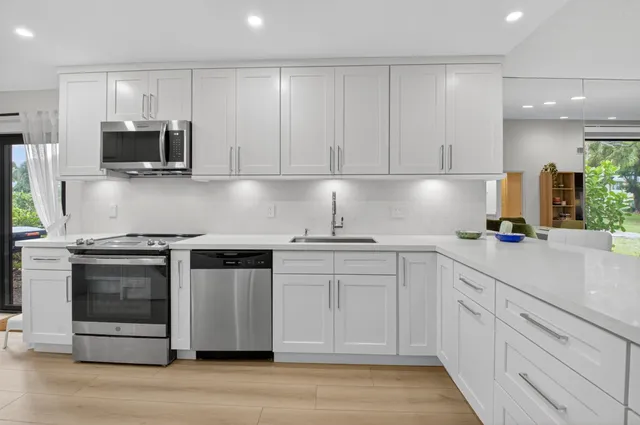 a lake view with a large trees