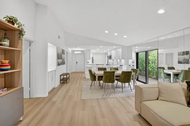 an aerial view of a houses with outdoor space and street view