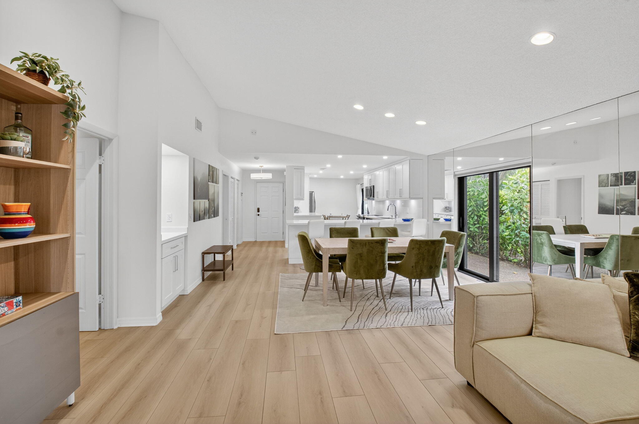 24 Westgate Lane, Unit A Boynton Beach, FL 33436 - Photo 27 of 94 a living room with lots of furniture and a wooden floor