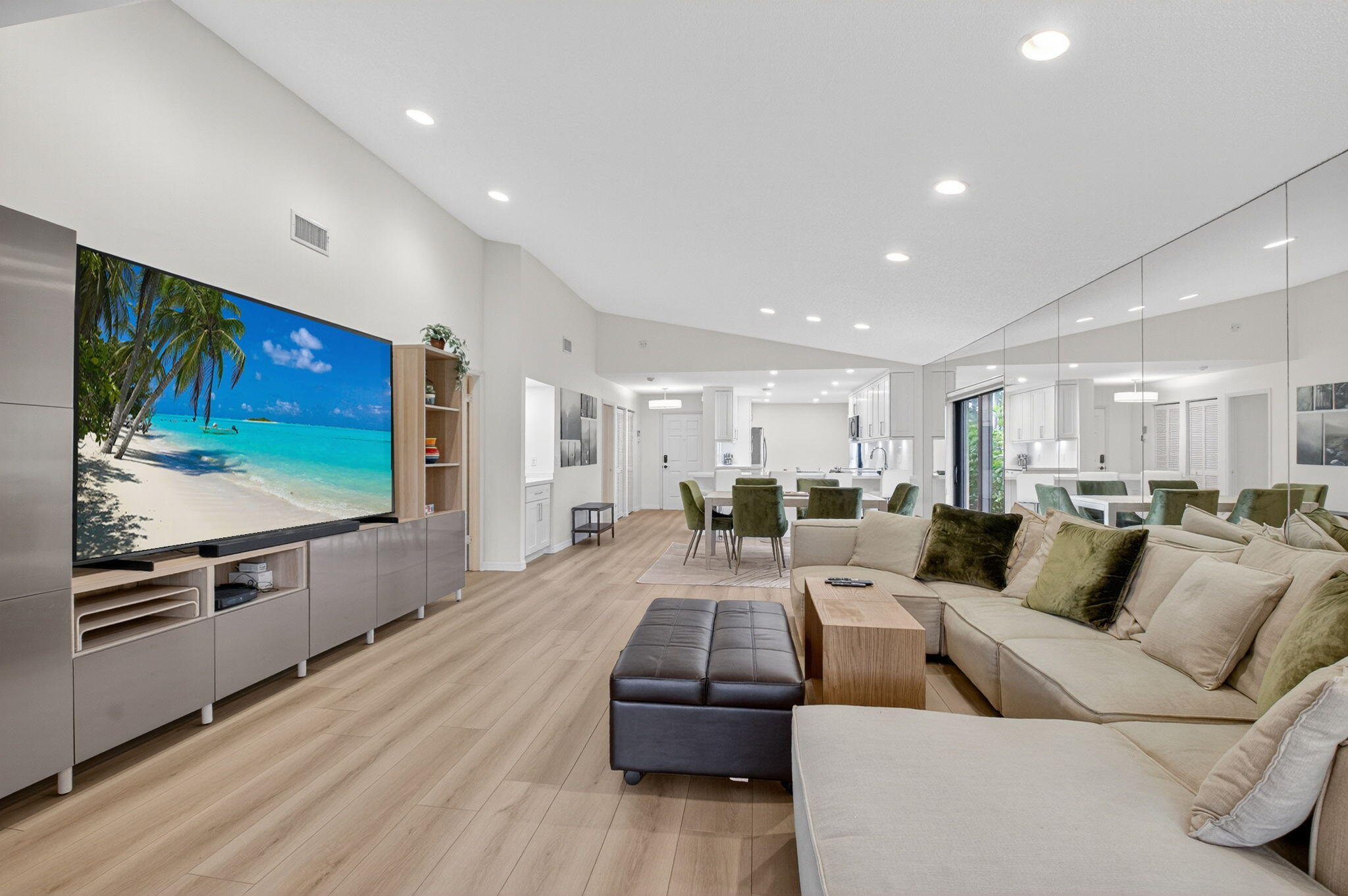 24 Westgate Lane, Unit A Boynton Beach, FL 33436 - Photo 29 of 94 a living room with furniture and a flat screen tv