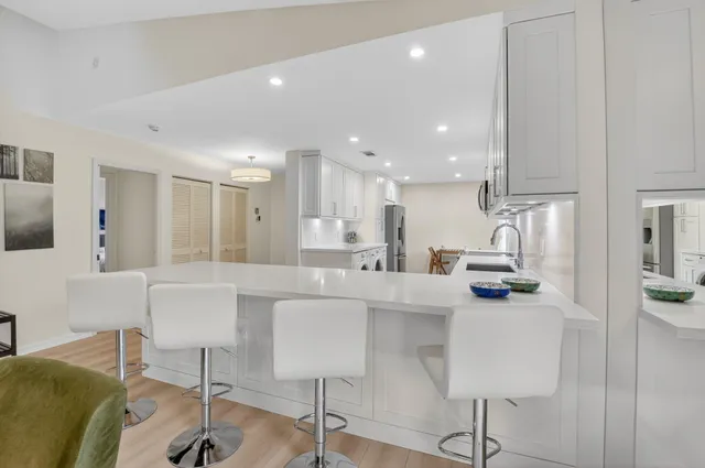 a view of a pathway both side of the house