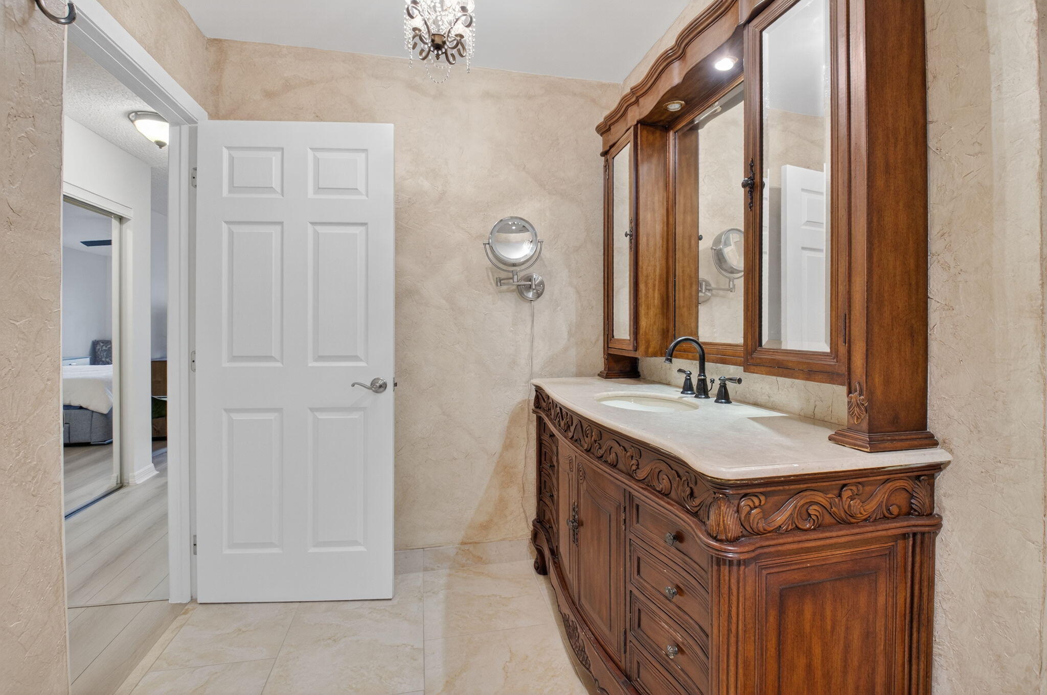 24 Westgate Lane, Unit A Boynton Beach, FL 33436 - Photo 34 of 94 a bathroom with a sink double vanity and a mirror