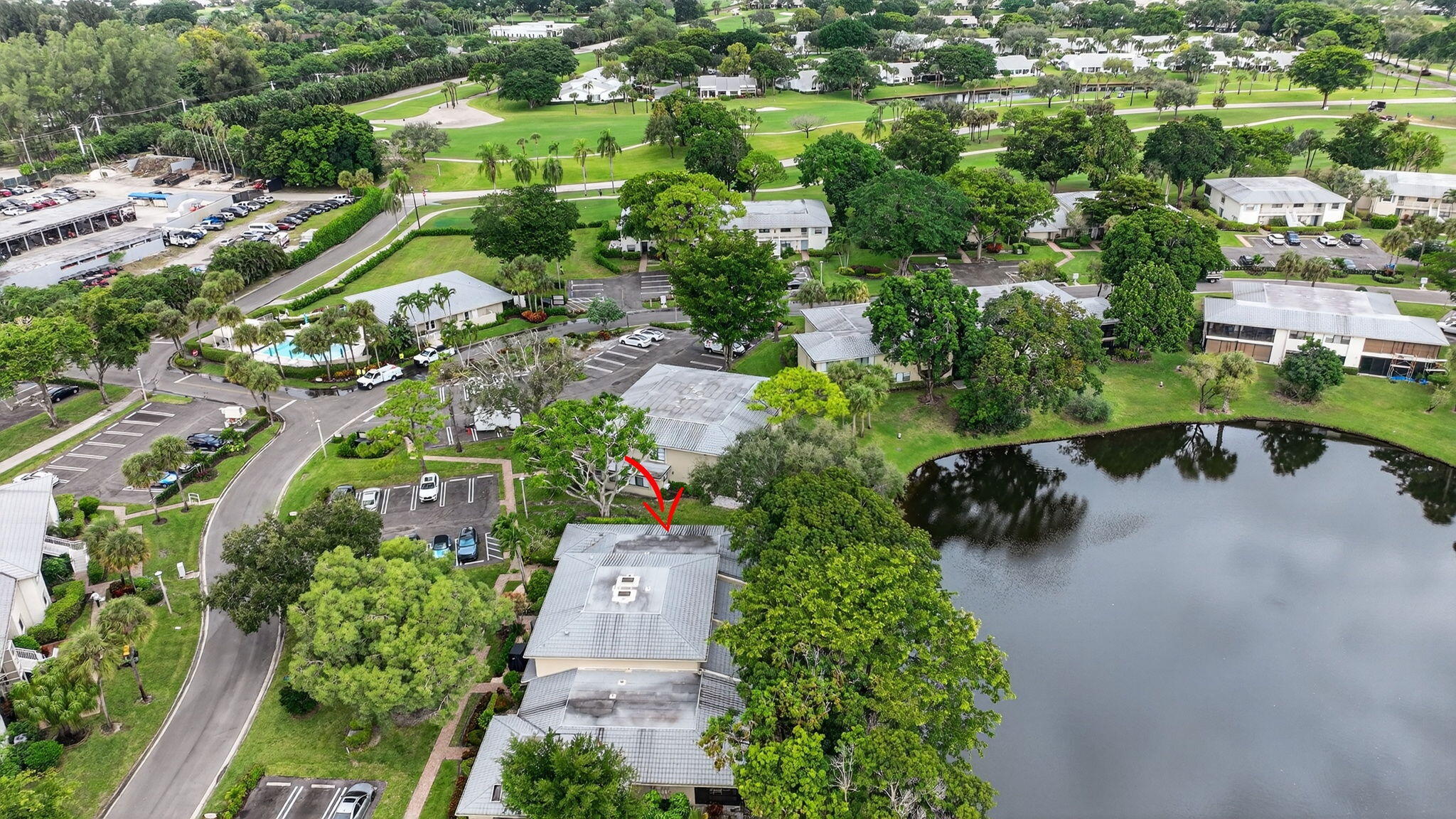 24 Westgate Lane, Unit A Boynton Beach, FL 33436 - Photo 44 of 94 an aerial view of a house with a yard and lake view