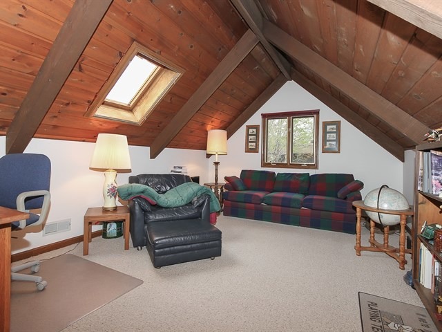 27 Green Ridge Road Elgin, IL 60120 - Photo 12 of 21 a living room with furniture and a window