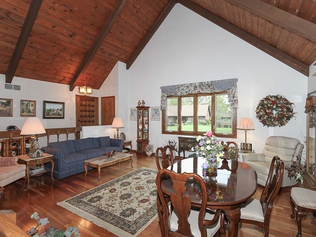 27 Green Ridge Road Elgin, IL 60120 - Photo 4 of 21 a living room with furniture and a large window