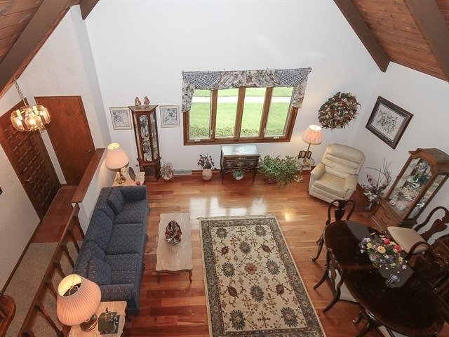27 Green Ridge Road Elgin, IL 60120 - Photo 6 of 21 a living room with furniture and a fireplace