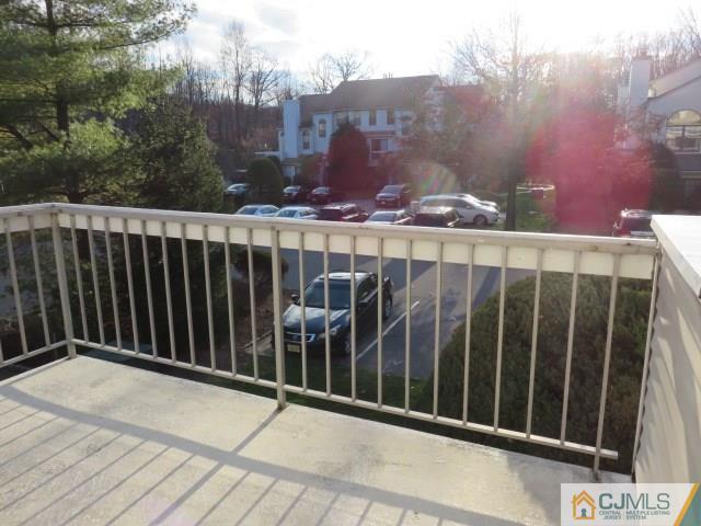 5006 Stonehedge Road Edison, NJ 08820 - Photo 4 of 14 a view of a balcony with an outdoor space