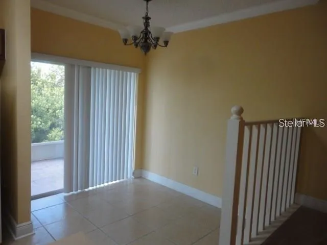a view of a hallway with a window