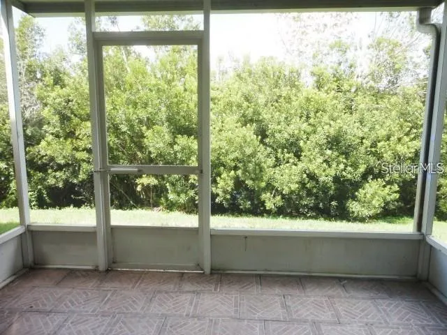a view of bathroom with a large window