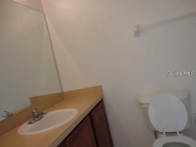 a bathroom with a sink and a toilet