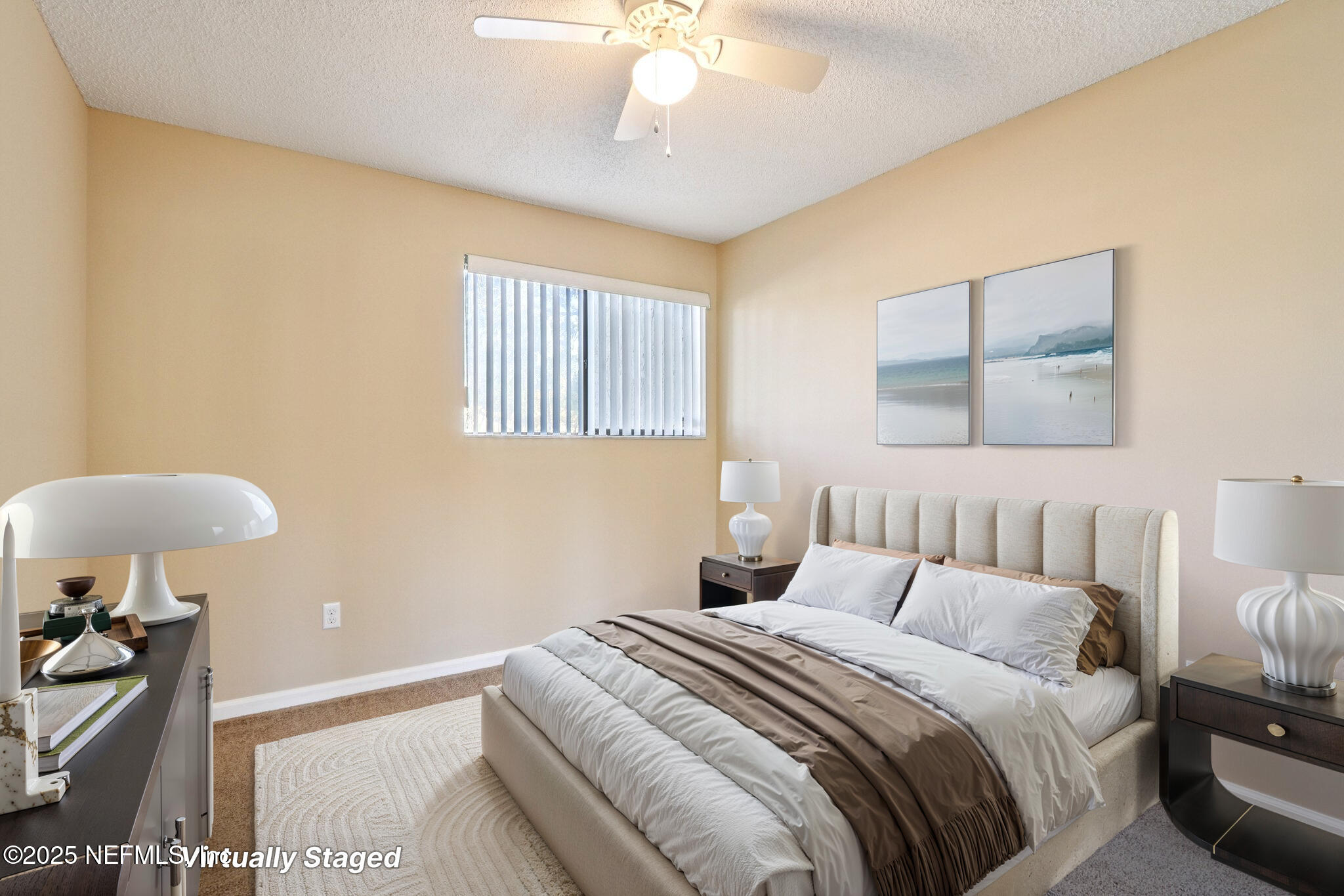 3801 Crown Point Road, Unit 2212 Jacksonville, FL 32257 - Photo 16 of 25 a bedroom with a bed and a chandelier
