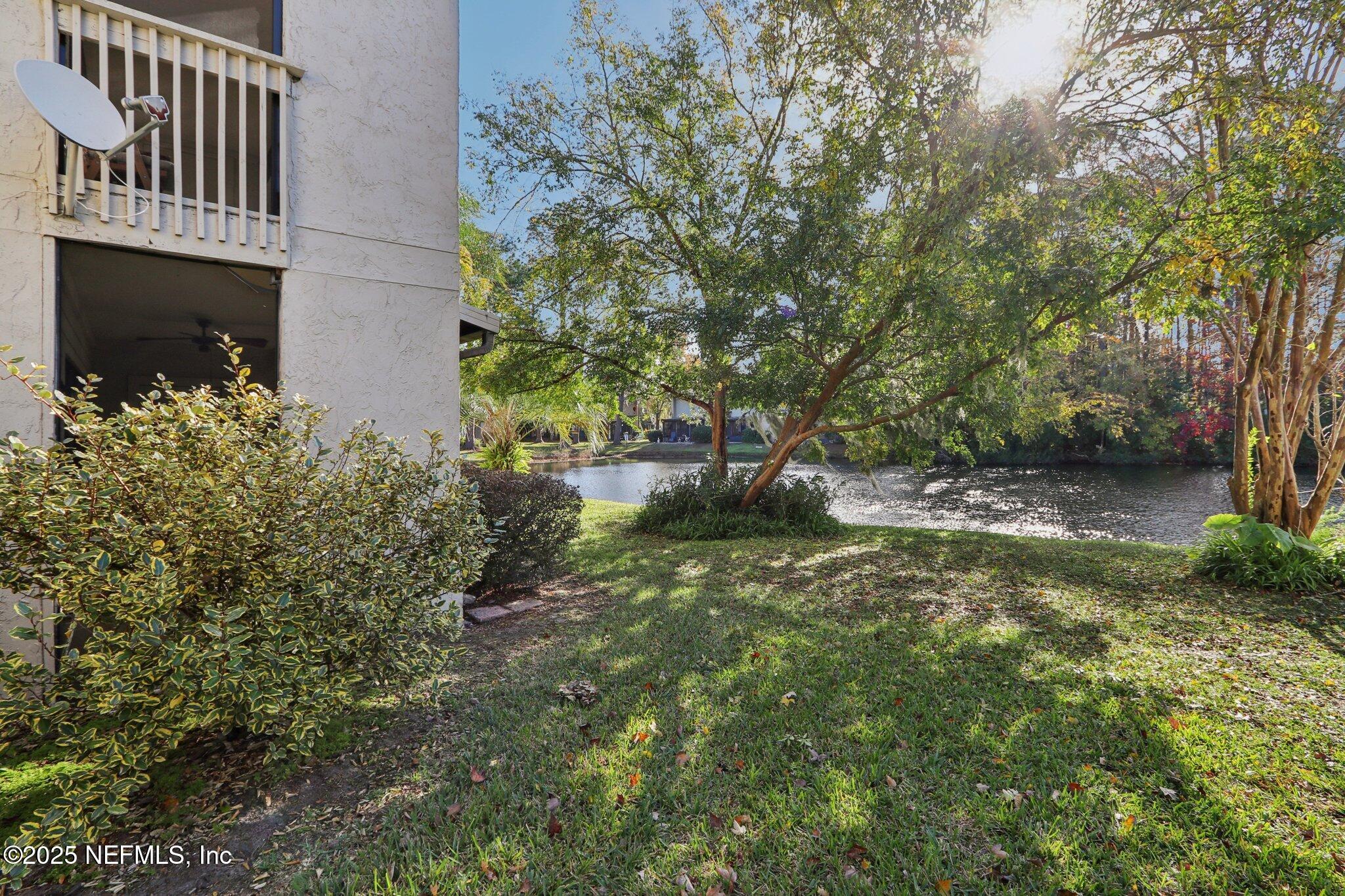 3801 Crown Point Road, Unit 2212 Jacksonville, FL 32257 - Photo 20 of 25 a view of a yard in front of house