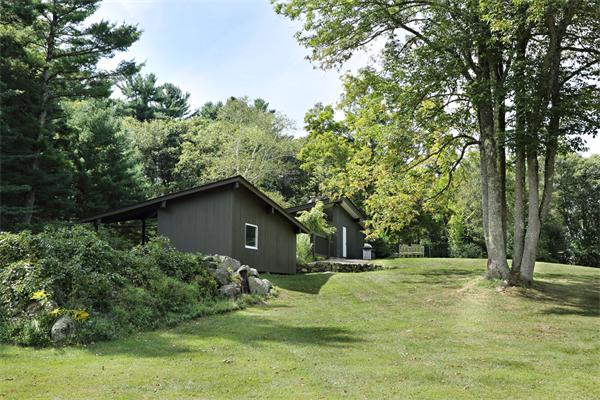 5 Old Conant Road Lincoln, MA 01773 - Photo 13 of 15 a yellow house with trees in the background