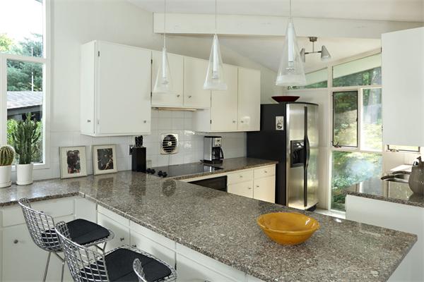 5 Old Conant Road Lincoln, MA 01773 - Photo 5 of 15 a kitchen with stainless steel appliances granite countertop a sink a stove and a refrigerator