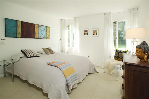 5 Old Conant Road Lincoln, MA 01773 - Photo 10 of 15 a bedroom with a bed and a flat screen tv